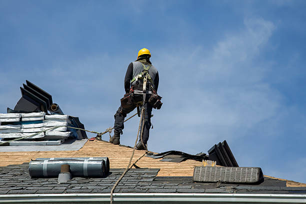 Professional Storm Damage Roof Repair technician working in Cooke City, MT